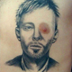 Illustration for article titled Behold, the worst Radiohead tattoo that has ever existed